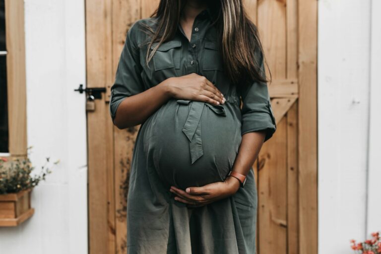 a woman near the end of her pregnancy during the third trimester