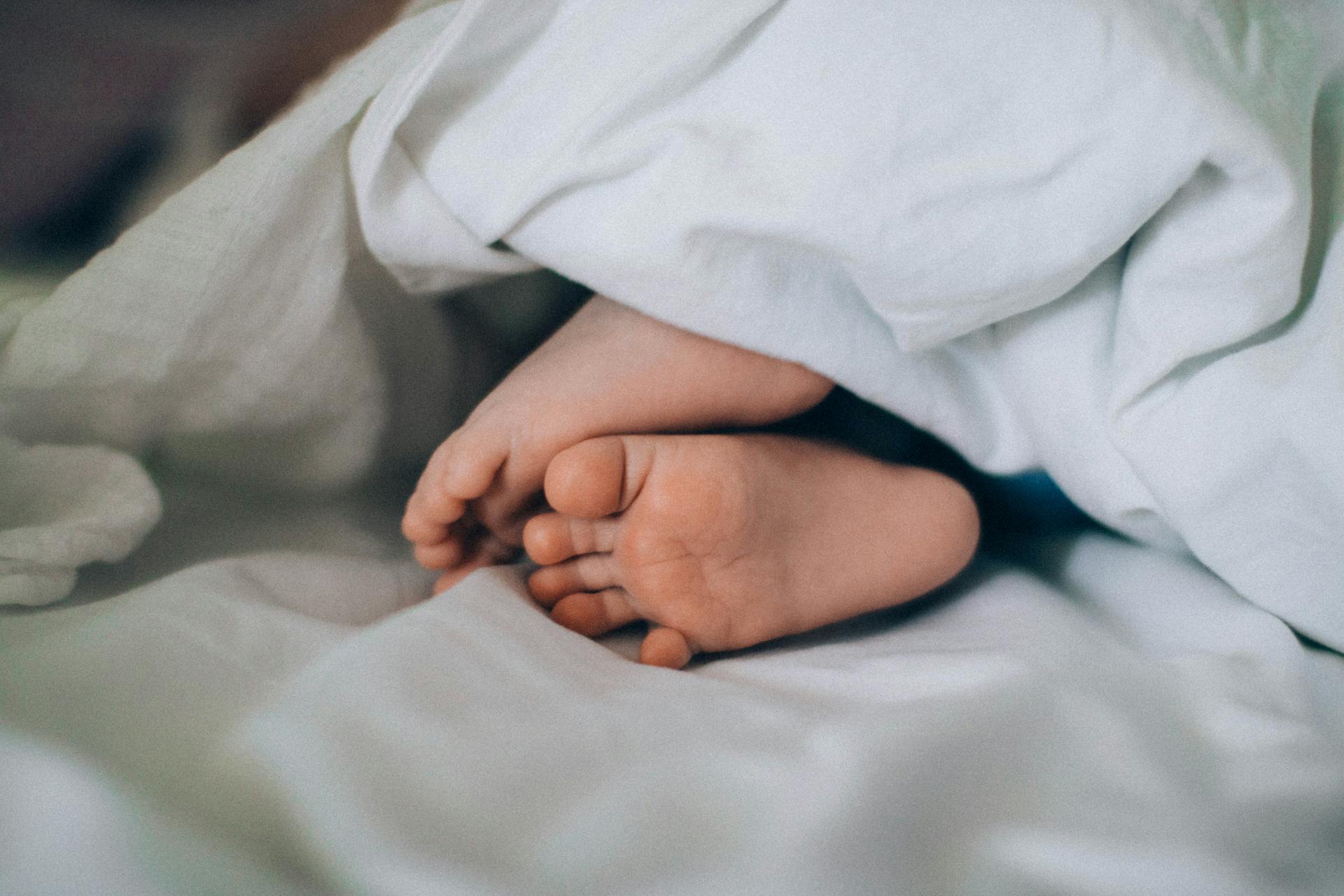 baby sleeping in bed